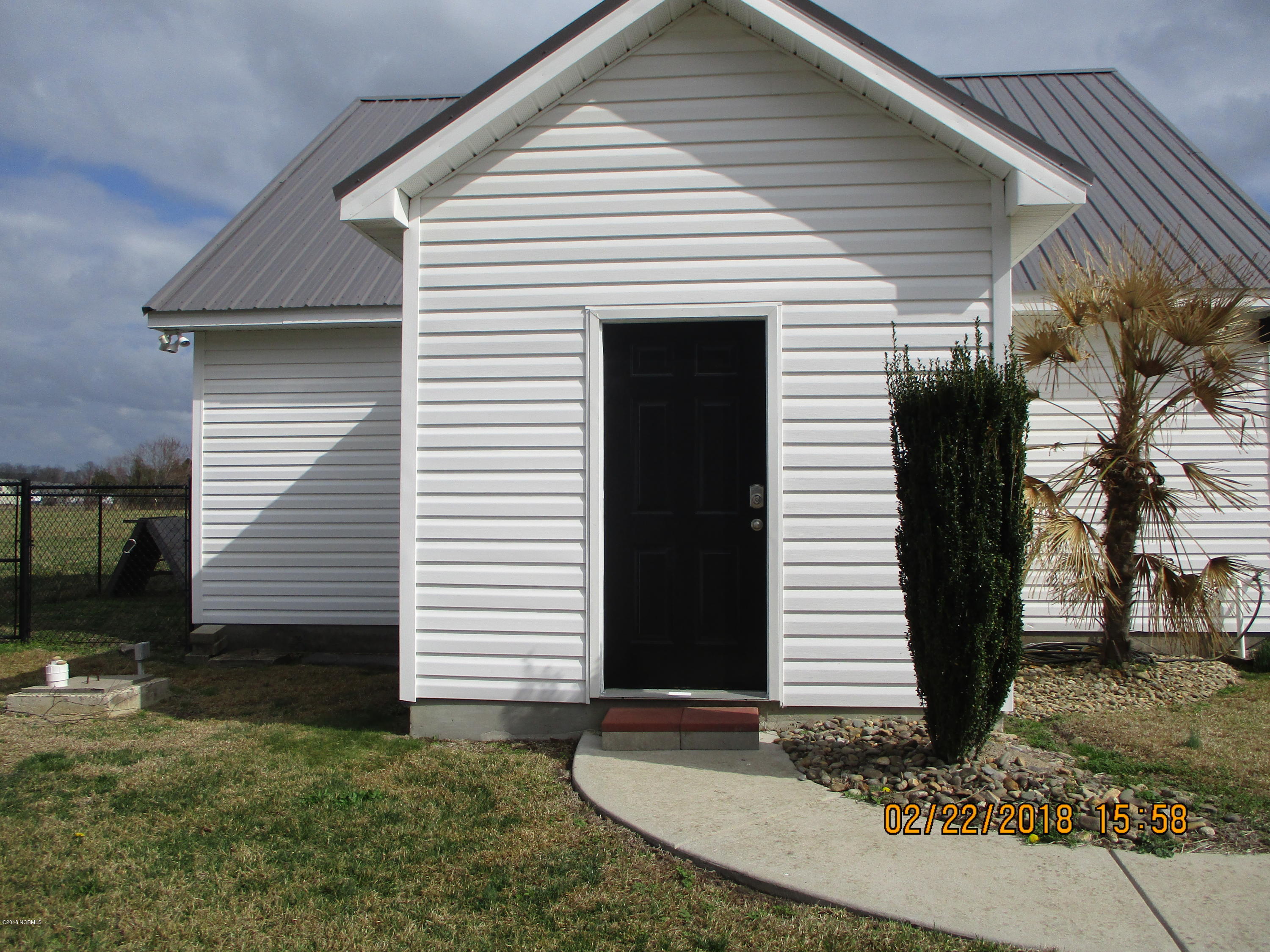 1052 Forlines Road, Unit 1 Winterville, NC 28590 - Photo 10 of 33 Bathroom entry from pool area and also from Building