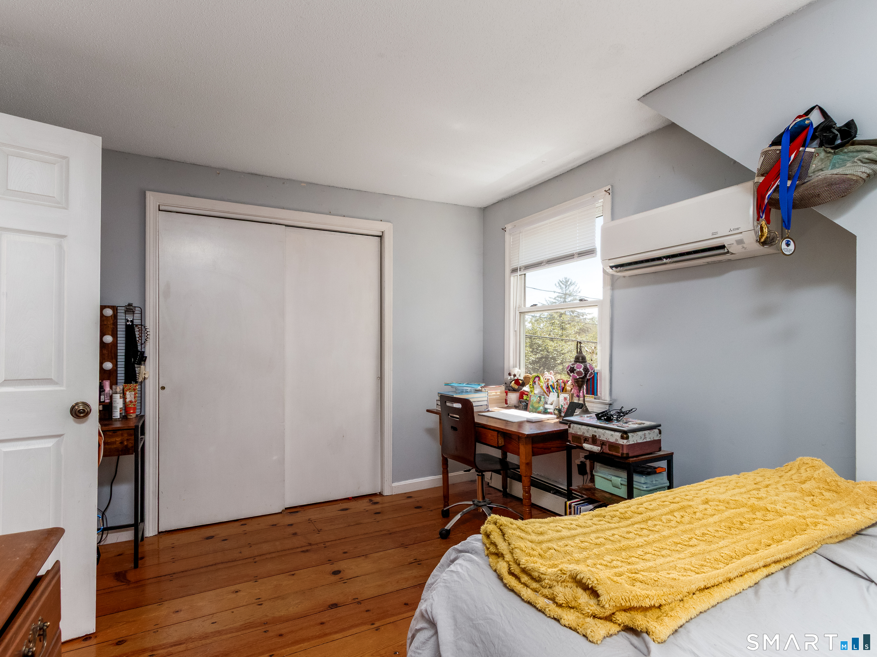 15 Bluff Avenue Clinton, CT 06413 - Photo 22 of 38 a bed room with a bed and a window
