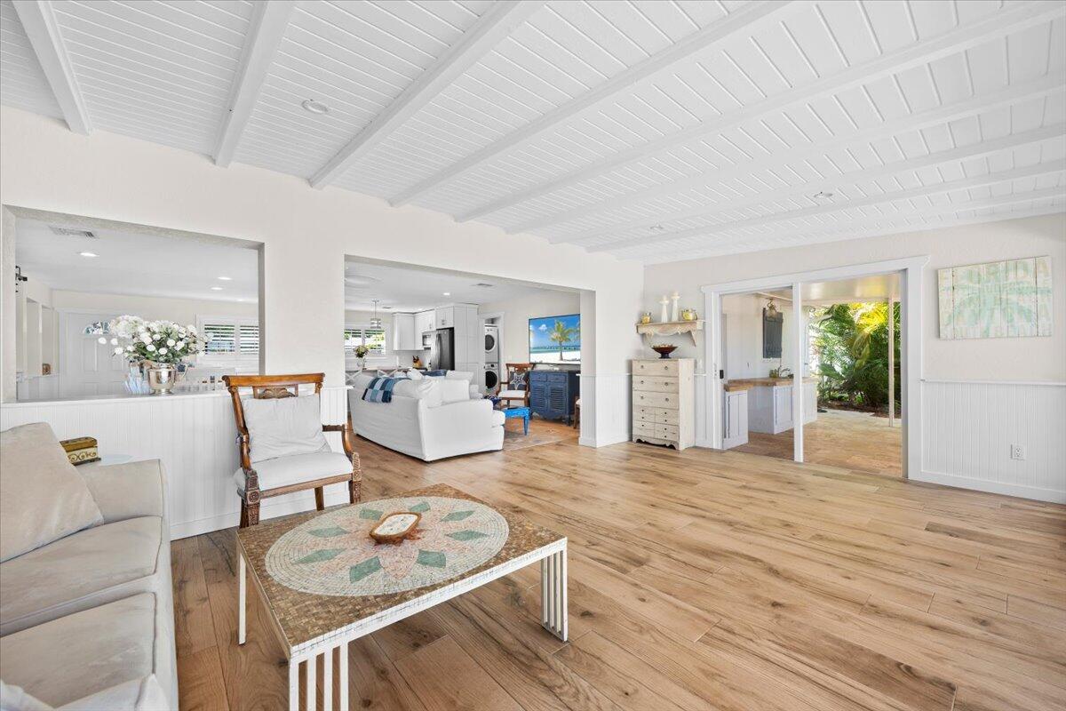 119 Elsa Road Jupiter, FL 33477 - Photo 25 of 38 a living room with furniture and wooden floor