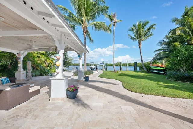 a view of a swimming pool with a patio
