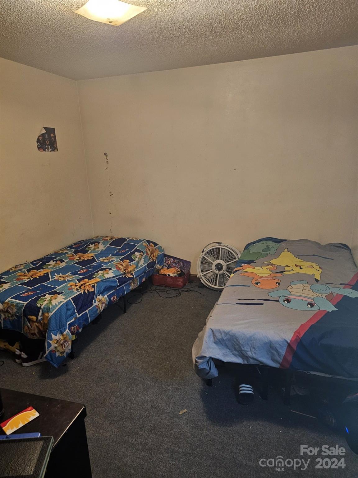 716 Edgehill Drive Monroe, NC 28110 - Photo 12 of 22 a bed sitting in a bedroom next to a larger window