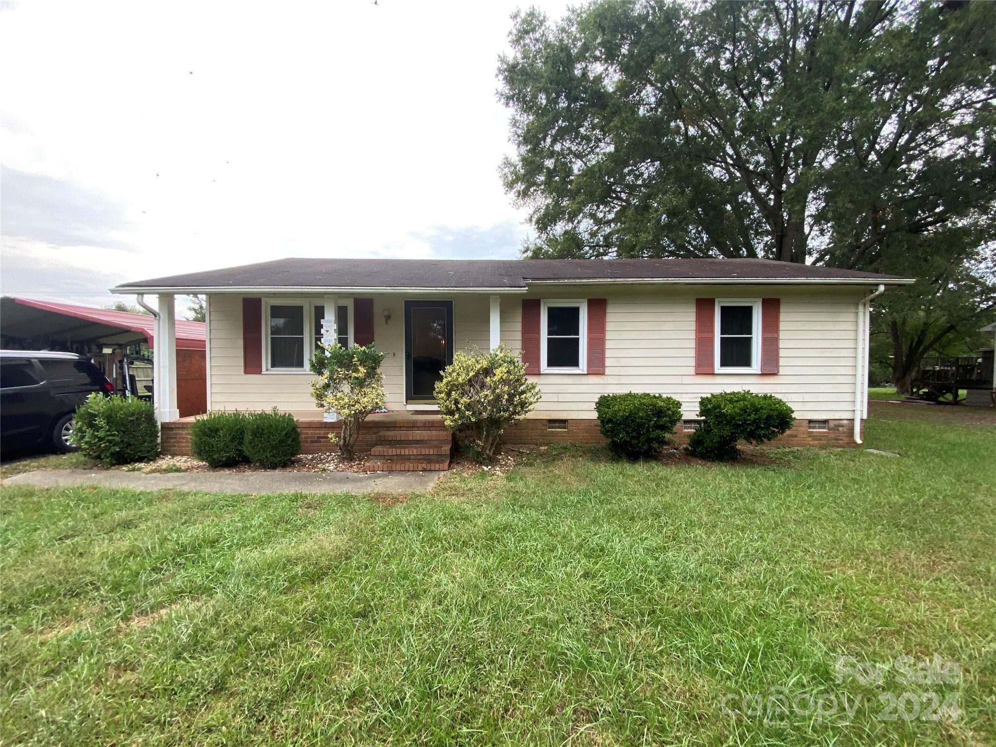 716 Edgehill Drive Monroe, NC 28110 - Photo 3 of 22 a front view of house with yard and green space