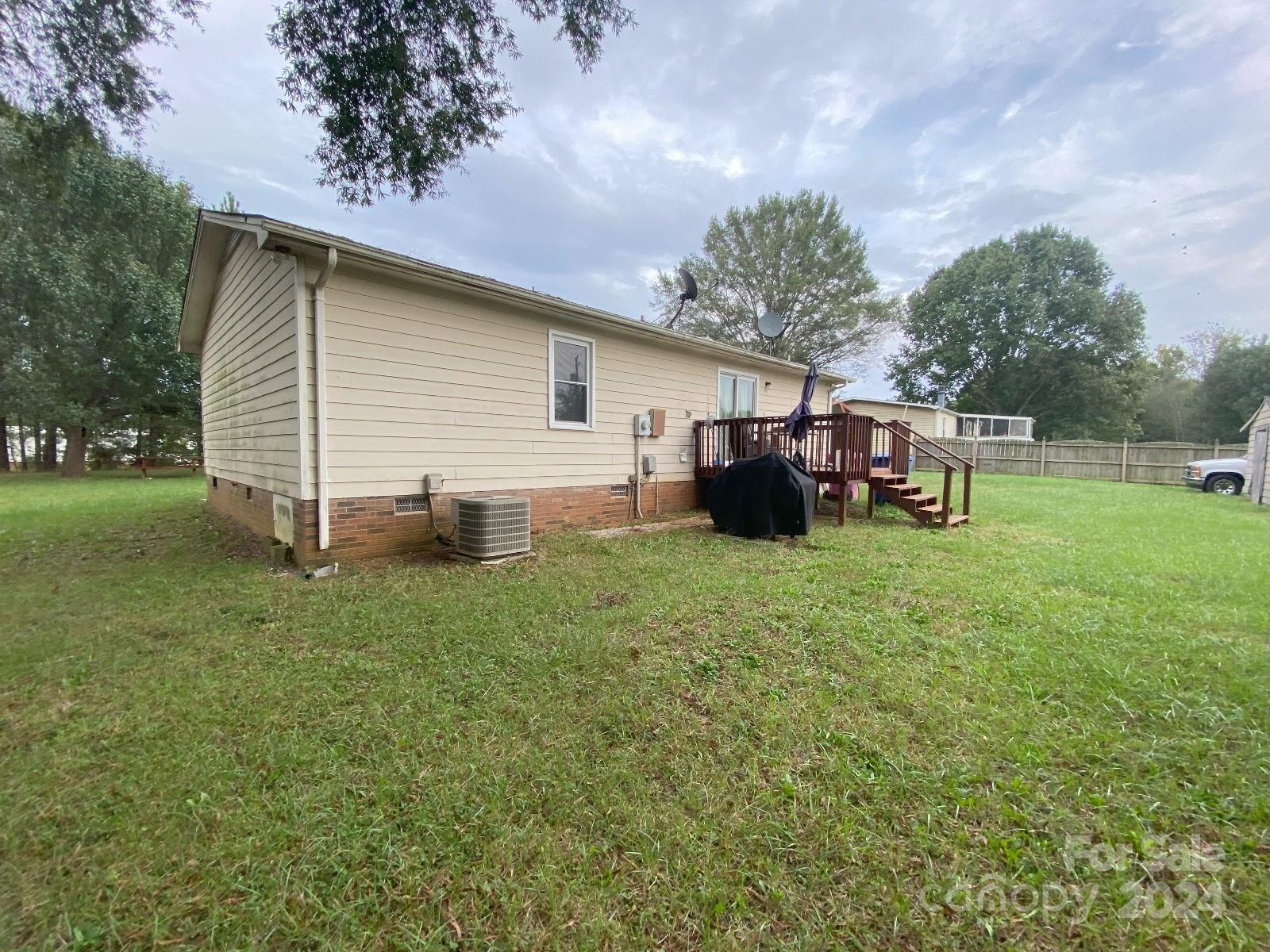 716 Edgehill Drive Monroe, NC 28110 - Photo 4 of 22 a view of a house with backyard