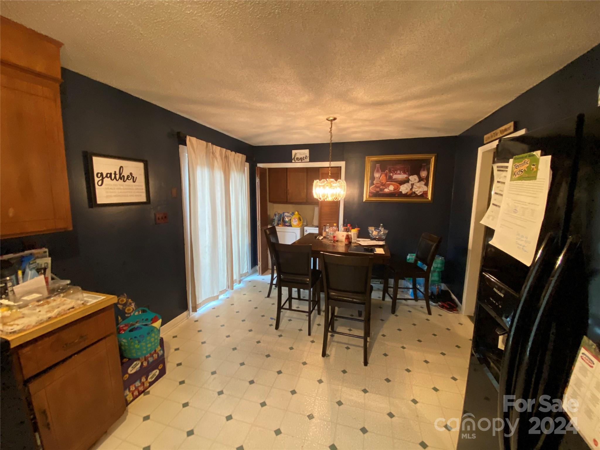 716 Edgehill Drive Monroe, NC 28110 - Photo 8 of 22 a view of a dining room with furniture and window