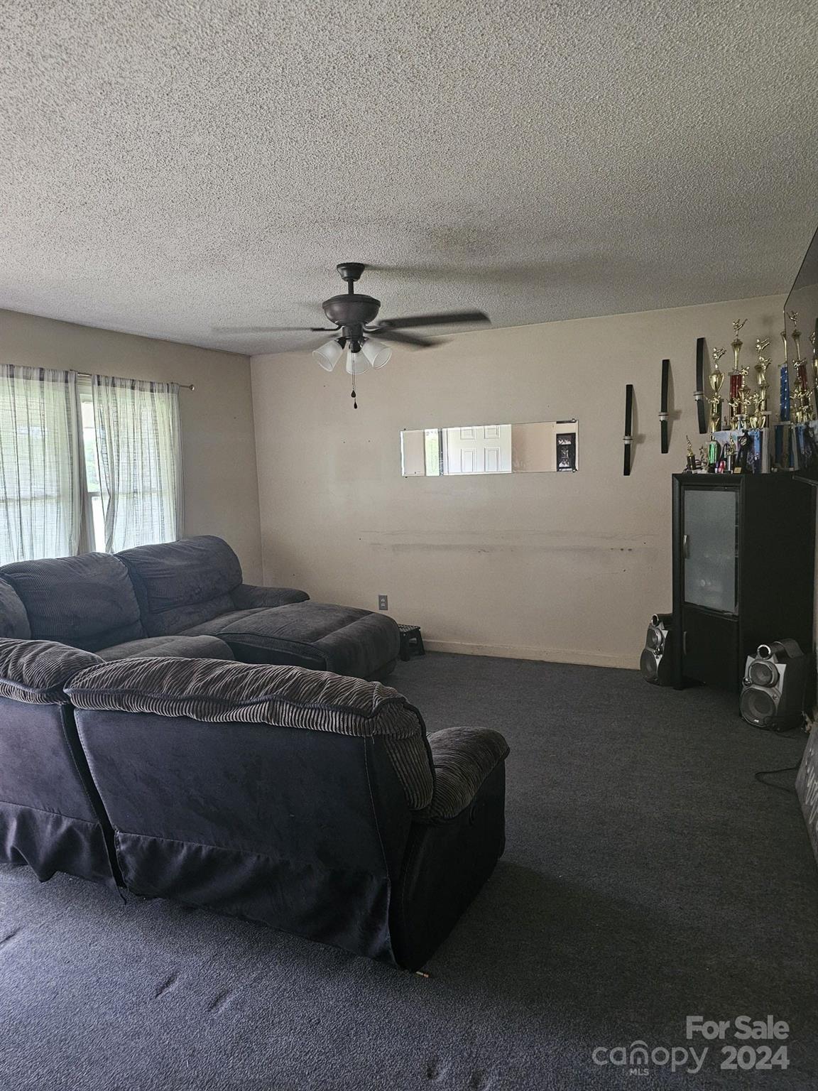 716 Edgehill Drive Monroe, NC 28110 - Photo 10 of 22 a bed room with a bed and a couch
