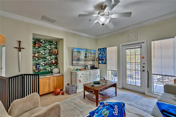 a living room with furniture and a window