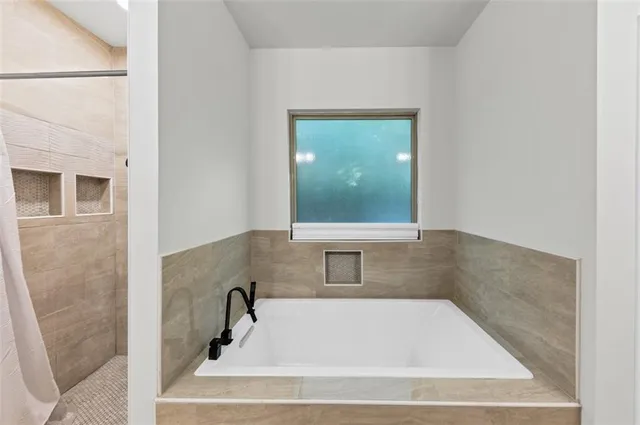 a bathroom with a bathtub