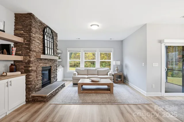 a white bath tub sitting next to a bathroom sink