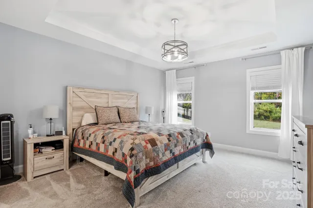 a bathroom with a shower and a shower curtain