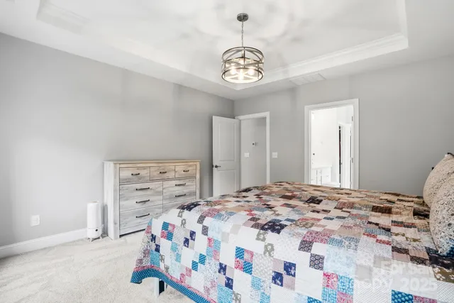 a room with furniture and a flat screen tv