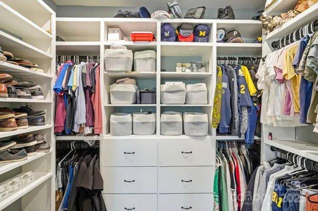 a bedroom with furniture and a couch