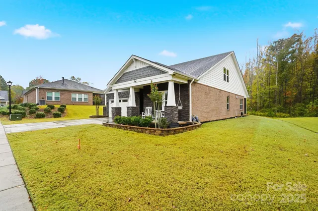 a view of a house with a swimming pool