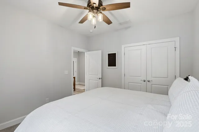 a view of house with swimming pool outdoor seating