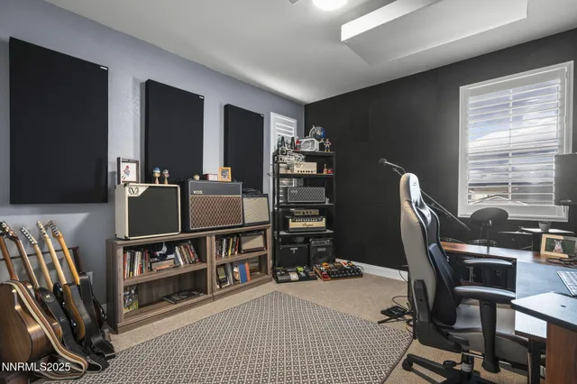 a workspace with furniture and window