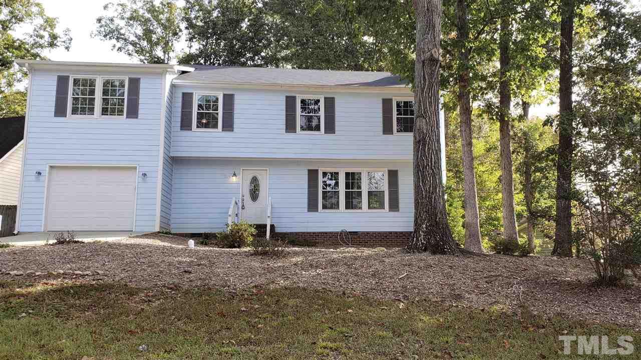 7300 Mine Shaft Road Raleigh, NC 27615 - Photo 1 of 22 front view of a house with a yard