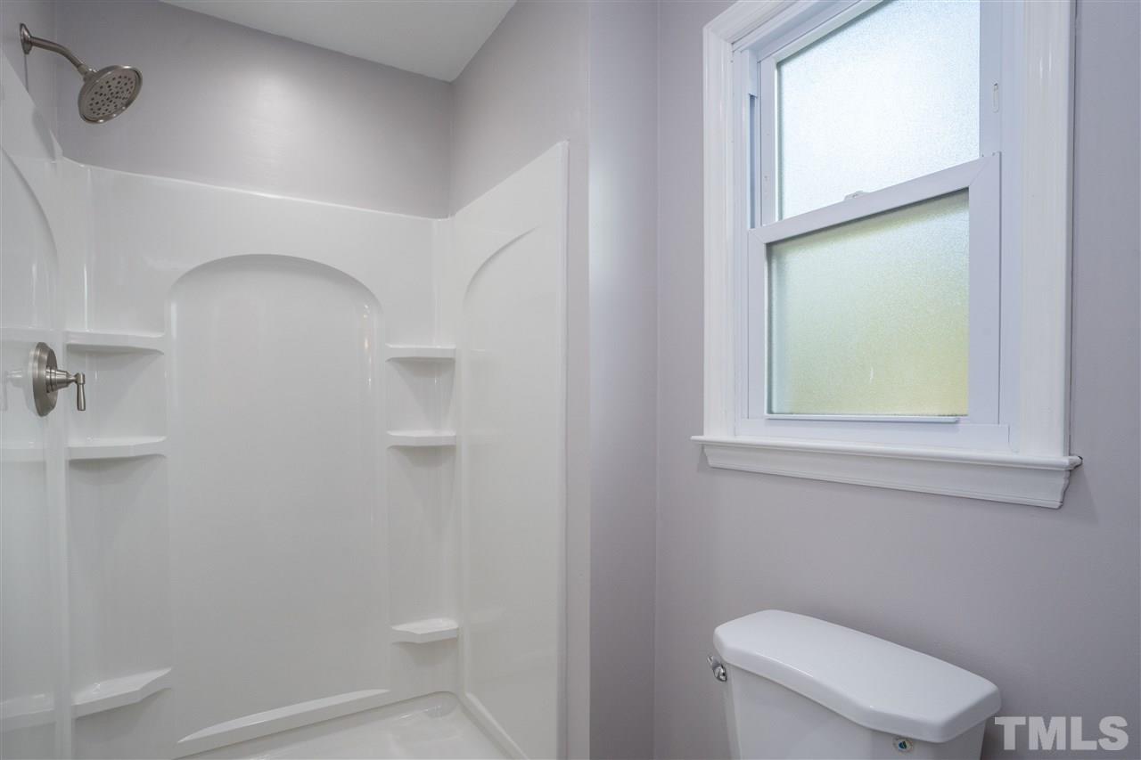 7300 Mine Shaft Road Raleigh, NC 27615 - Photo 16 of 22 a bathroom with a toilet