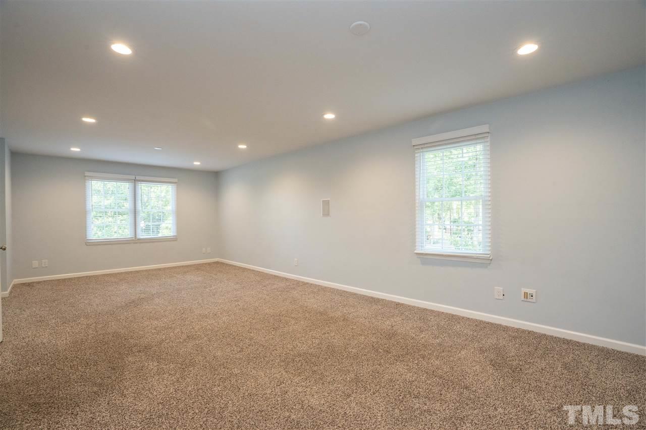 7300 Mine Shaft Road Raleigh, NC 27615 - Photo 21 of 22 an empty room with windows