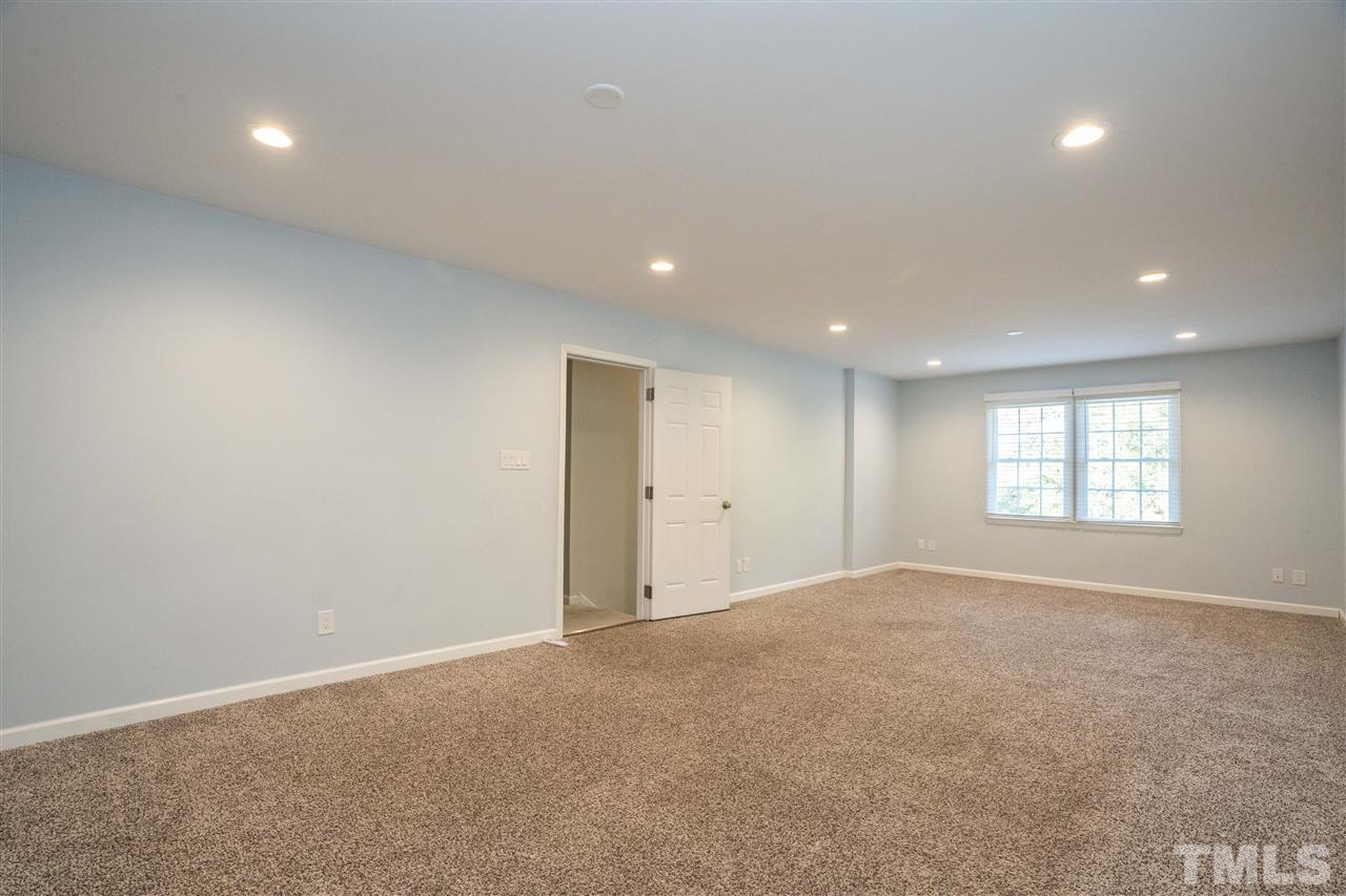 7300 Mine Shaft Road Raleigh, NC 27615 - Photo 22 of 22 an empty room with windows and closet