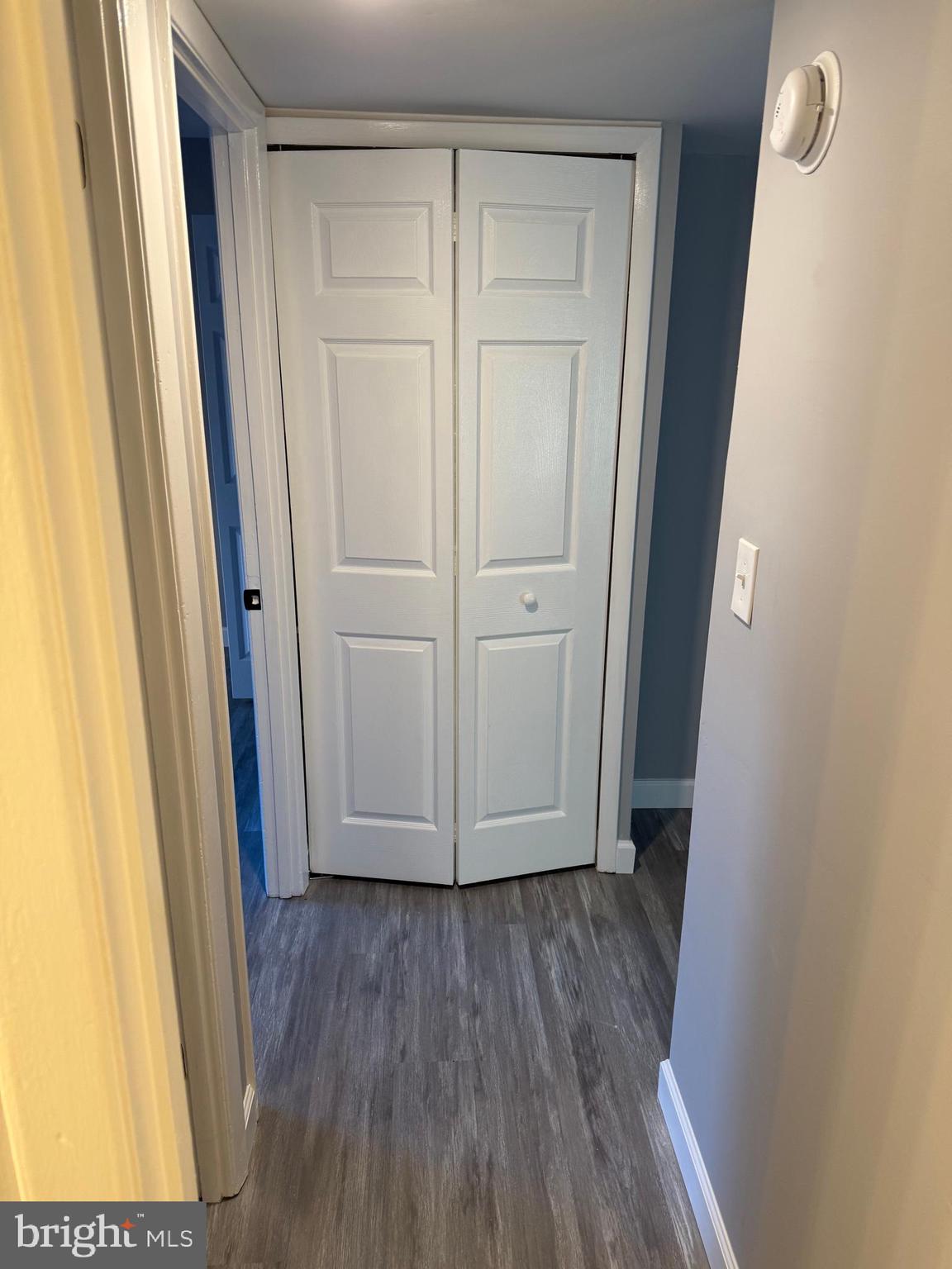 6029 Majors Lane, Unit 4 C16 Columbia, MD 21045 - Photo 26 of 51 a view of front door with wooden floor