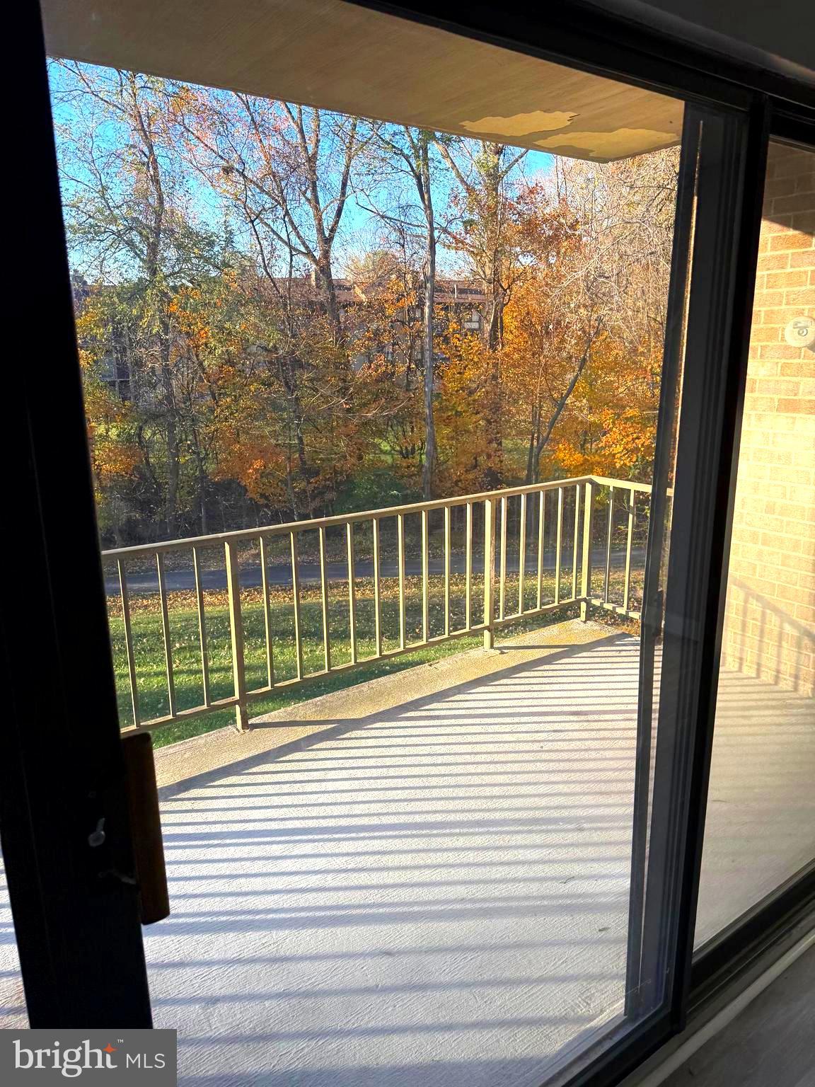 6029 Majors Lane, Unit 4 C16 Columbia, MD 21045 - Photo 47 of 51 a view of a wooden balcony