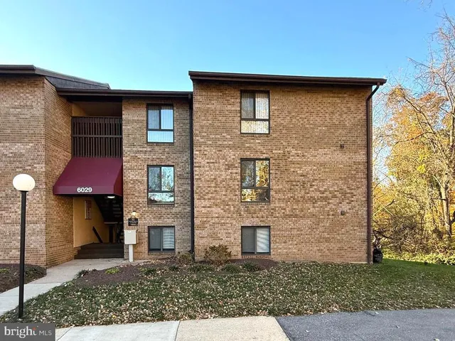 front view of a brick house with a door