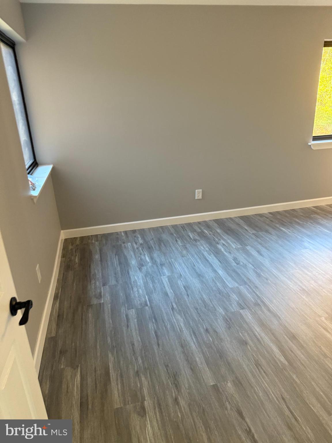 6029 Majors Lane, Unit 4 C16 Columbia, MD 21045 - Photo 5 of 51 wooden floor in an empty room