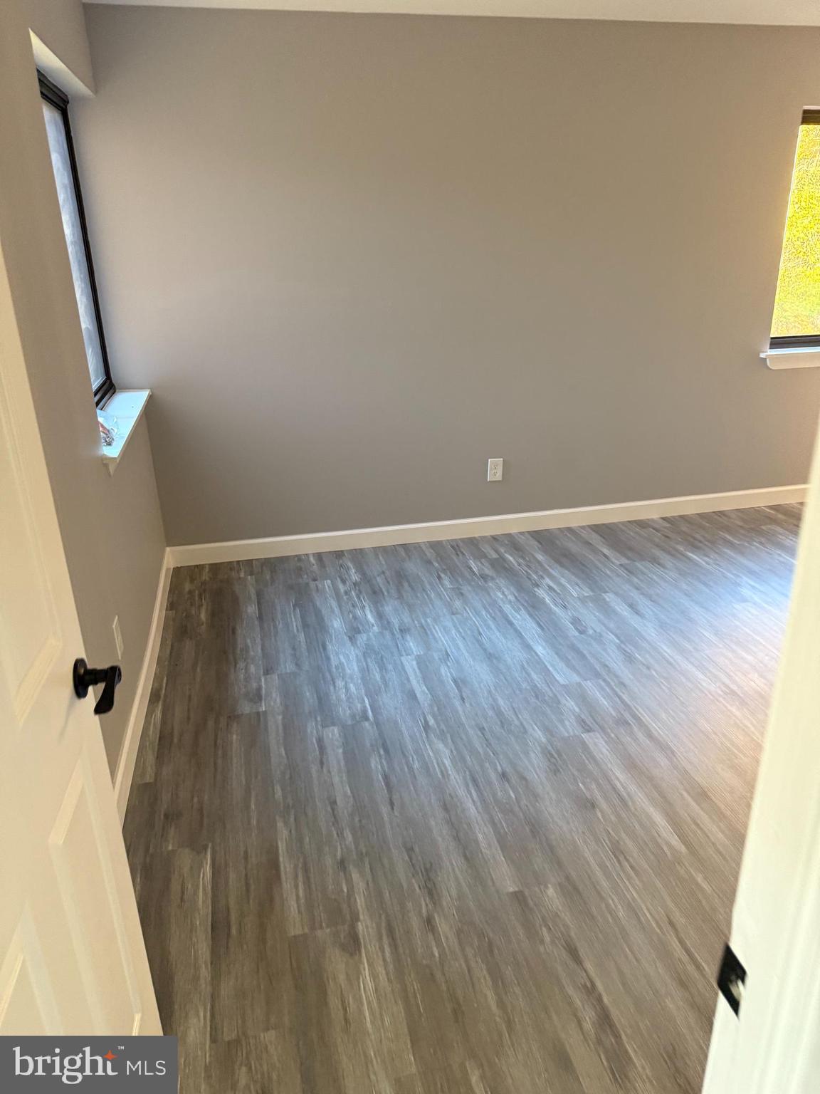6029 Majors Lane, Unit 4 C16 Columbia, MD 21045 - Photo 6 of 51 wooden floor in a gallery