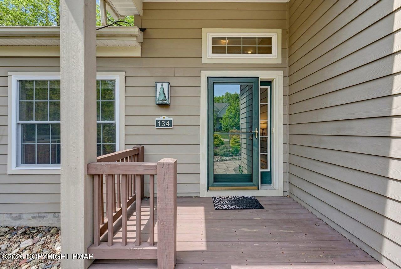 134 Skytop Road Long Pond, PA 18334 - Photo 2 of 48 a front view of a house with a porch