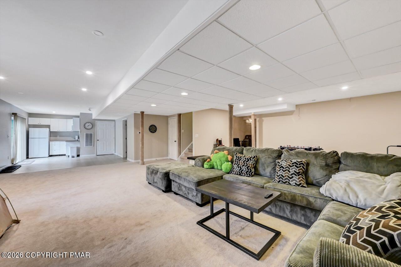 134 Skytop Road Long Pond, PA 18334 - Photo 38 of 48 a living room with furniture