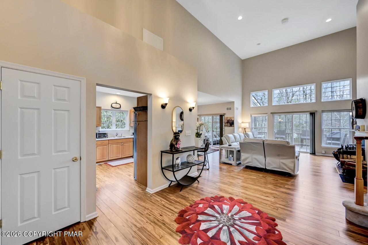 134 Skytop Road Long Pond, PA 18334 - Photo 4 of 48 a living room with furniture and a wooden floor