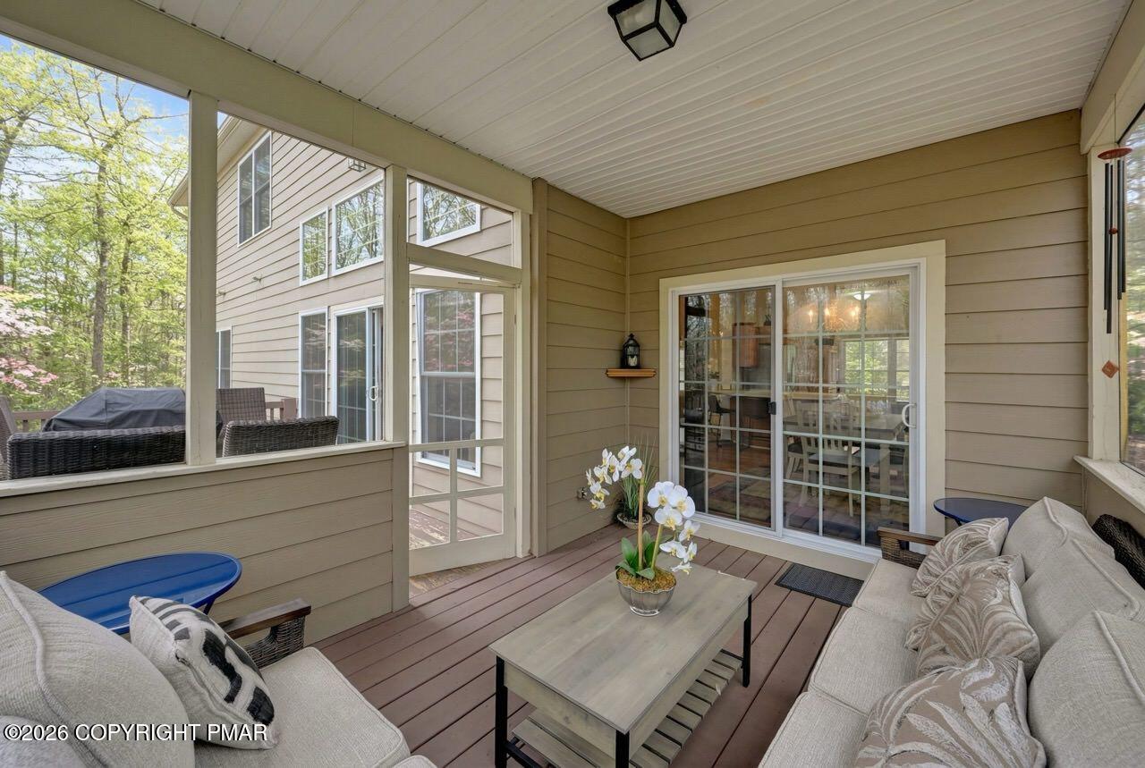 134 Skytop Road Long Pond, PA 18334 - Photo 44 of 48 a living room with furniture and a window