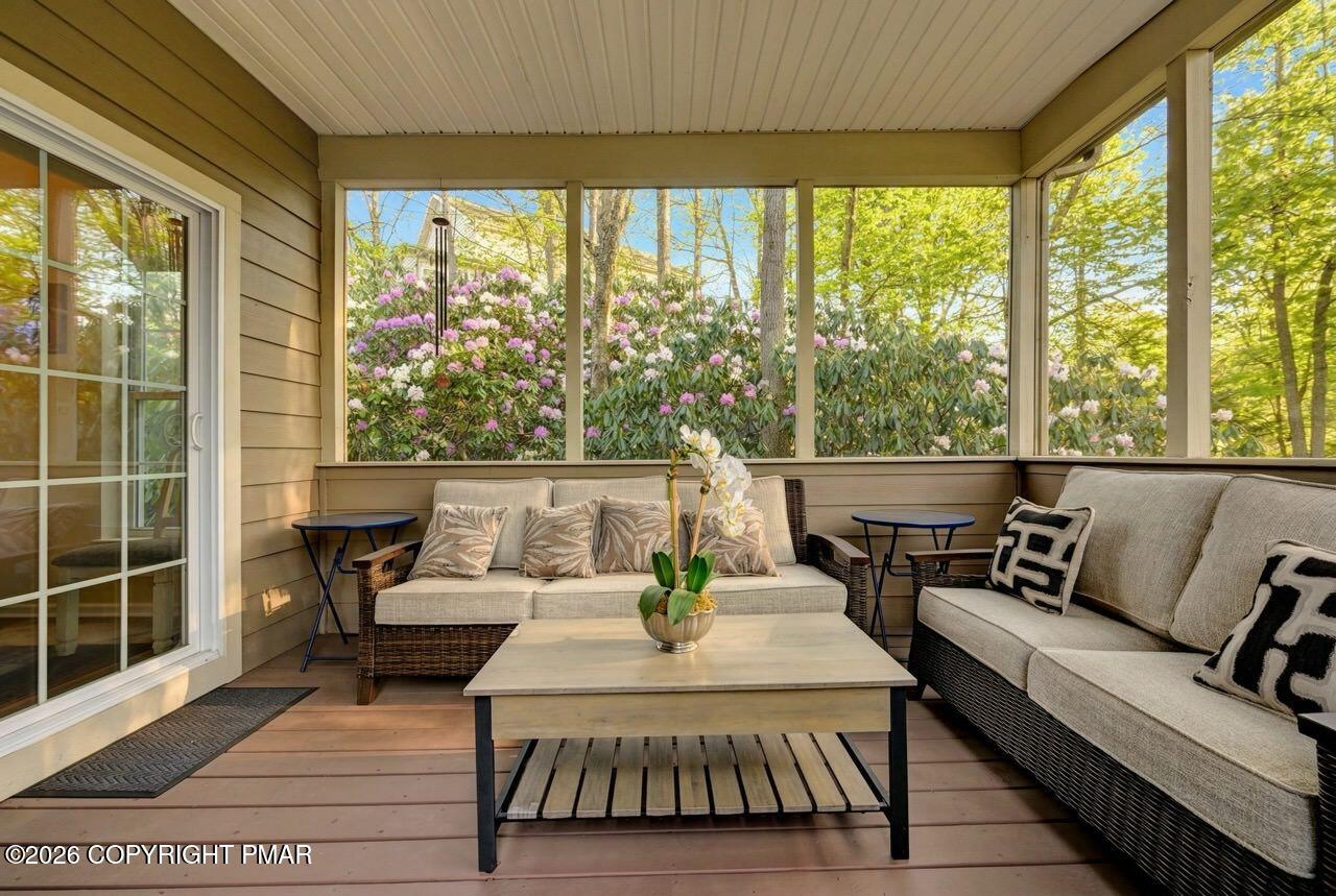 134 Skytop Road Long Pond, PA 18334 - Photo 45 of 48 a living room with furniture and a large window