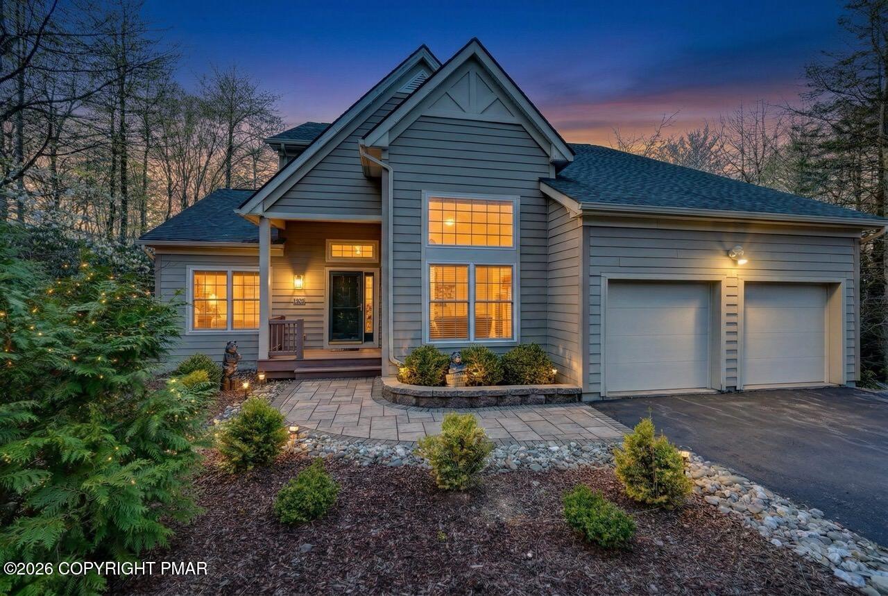 134 Skytop Road Long Pond, PA 18334 - Photo 47 of 48 a front view of a house with garden