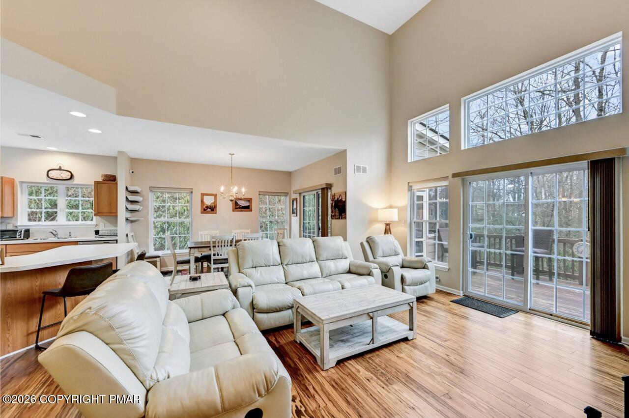 134 Skytop Road Long Pond, PA 18334 - Photo 48 of 48 a living room with furniture and a large window
