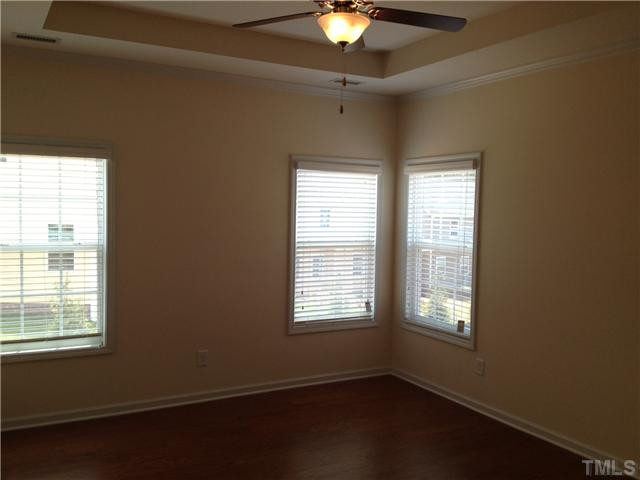 3 Hidden Ridge Court Durham, NC 27707 - Photo 9 of 20 1st floor owner's suite with hardwoods and trey ceiling!