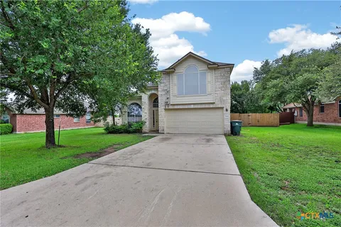 a front view of house with yard