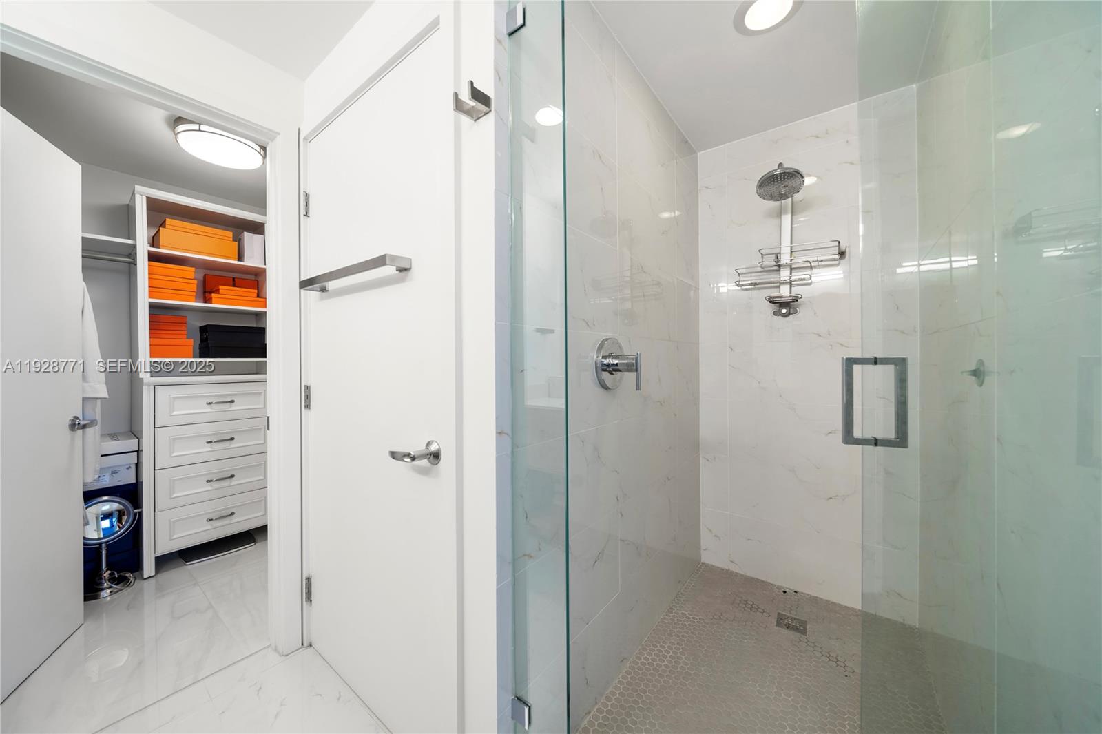 16385 Biscayne Boulevard, Unit 503 North Miami Beach, FL 33160 - Photo 12 of 50 a bathroom with a shower and a sink