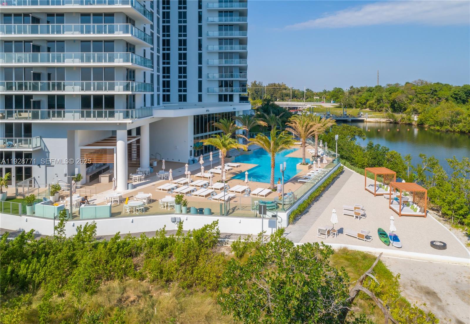 16385 Biscayne Boulevard, Unit 503 North Miami Beach, FL 33160 - Photo 27 of 50 a view of building with outdoor space and seating