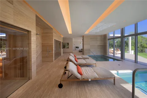 a bathroom with a bathtub and shower