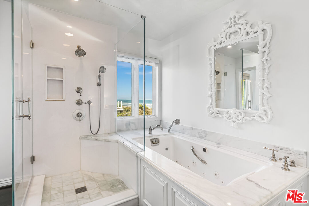 0 Broad Beach Road Malibu, CA 90265 - Photo 45 of 54 a bathroom with a tub sink shower and mirror
