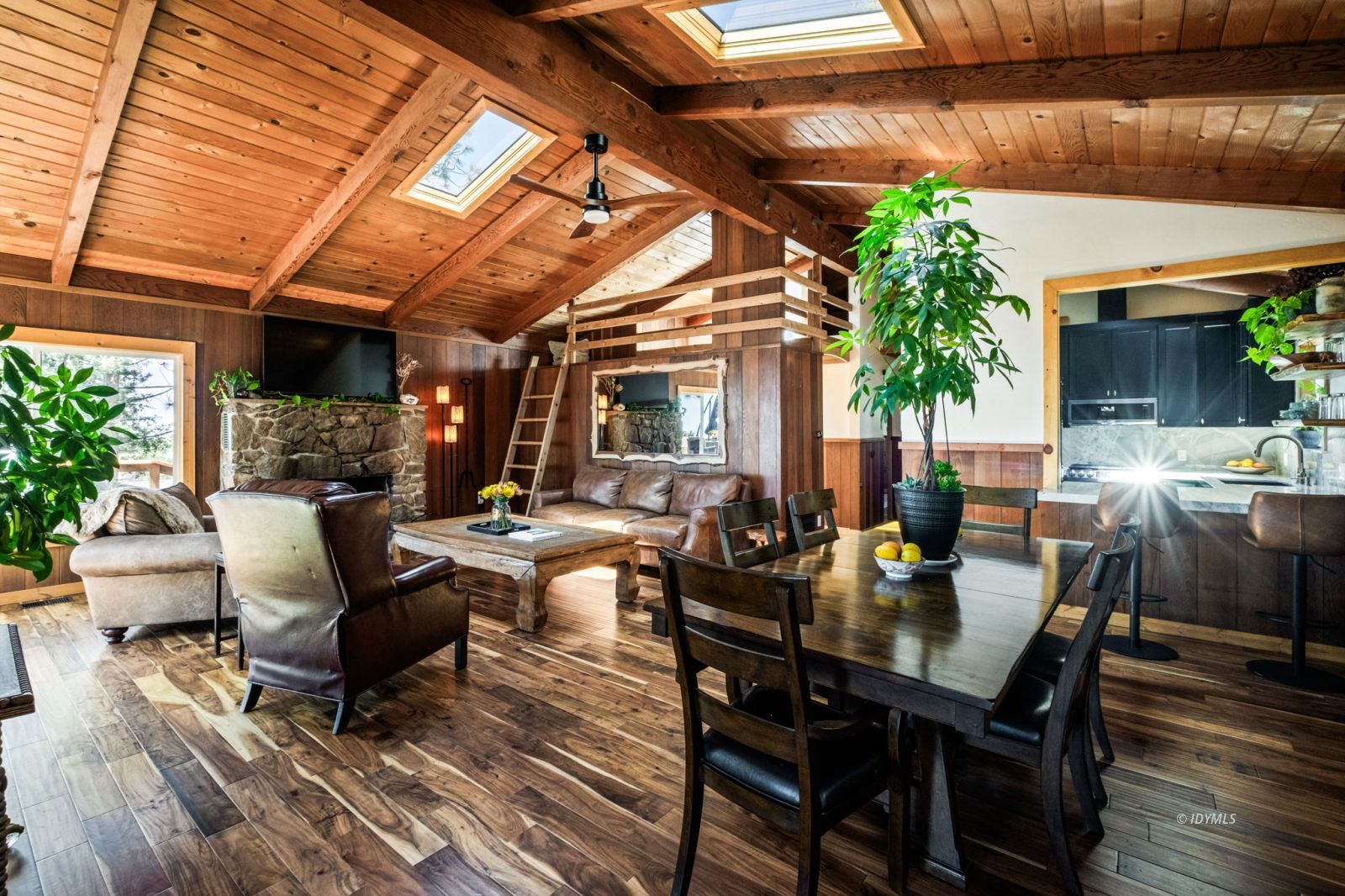 24750 Marion Ridge Drive Idyllwild, CA 92549 - Photo 12 of 45 a dining room with furniture and wooden floor