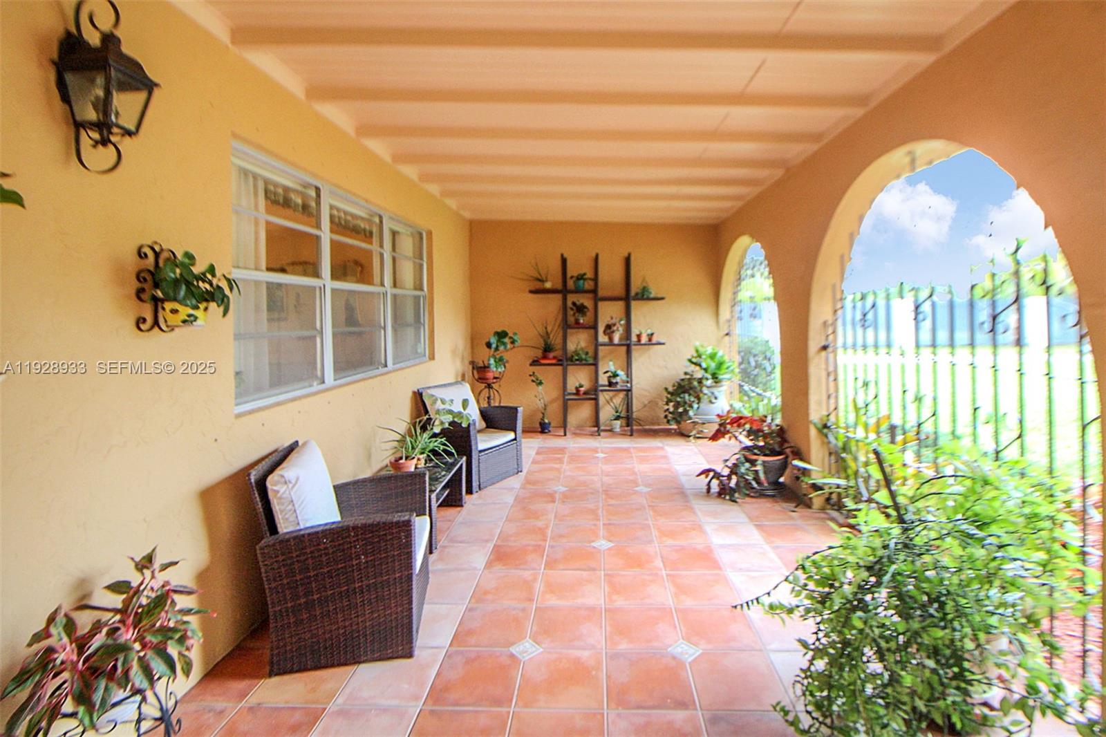 50 Southwest 130th Avenue Miami, FL 33184 - Photo 11 of 70 a lobby with furniture and floor to ceiling window