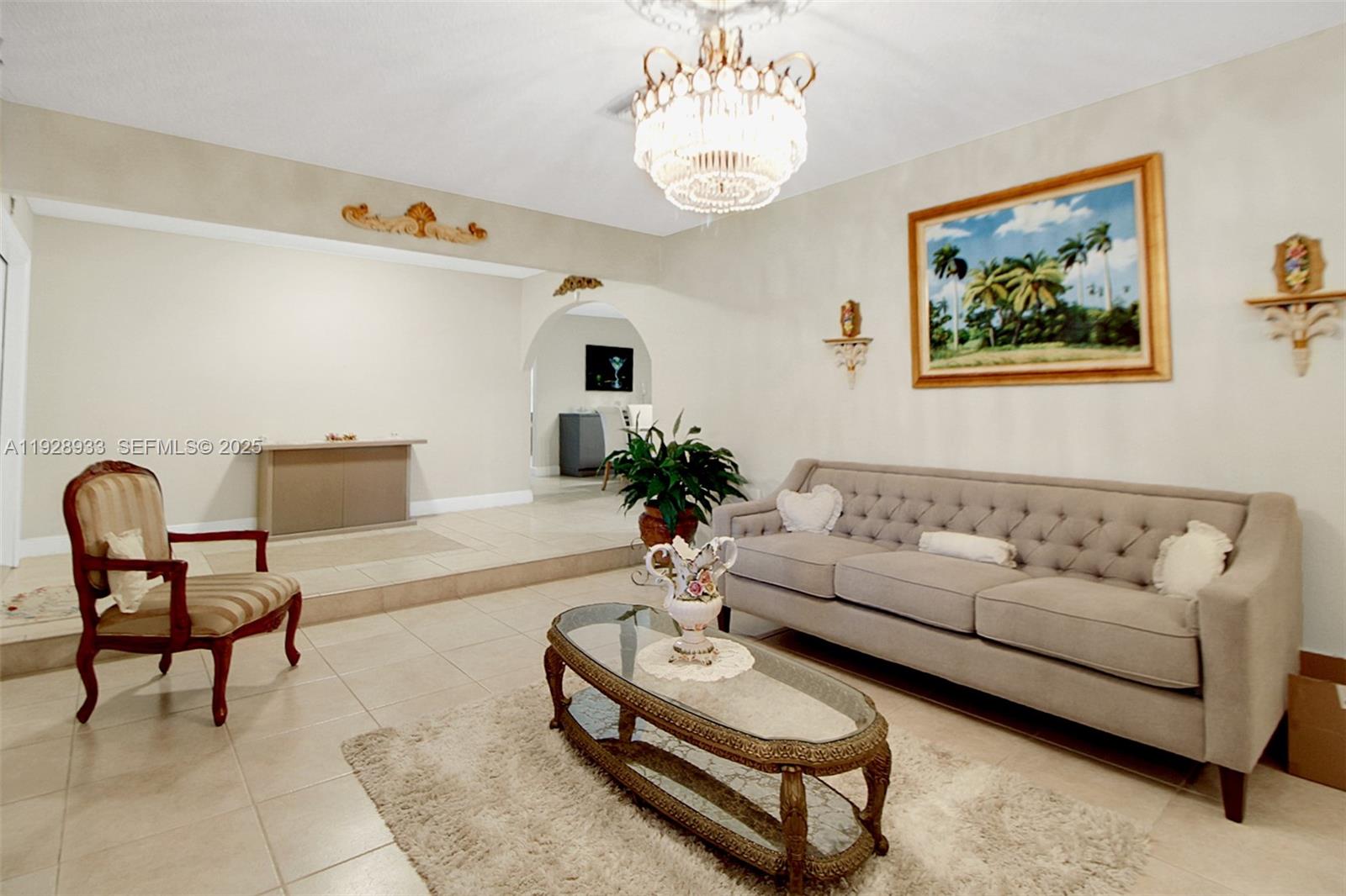 50 Southwest 130th Avenue Miami, FL 33184 - Photo 15 of 70 a living room with furniture a rug and a potted plant