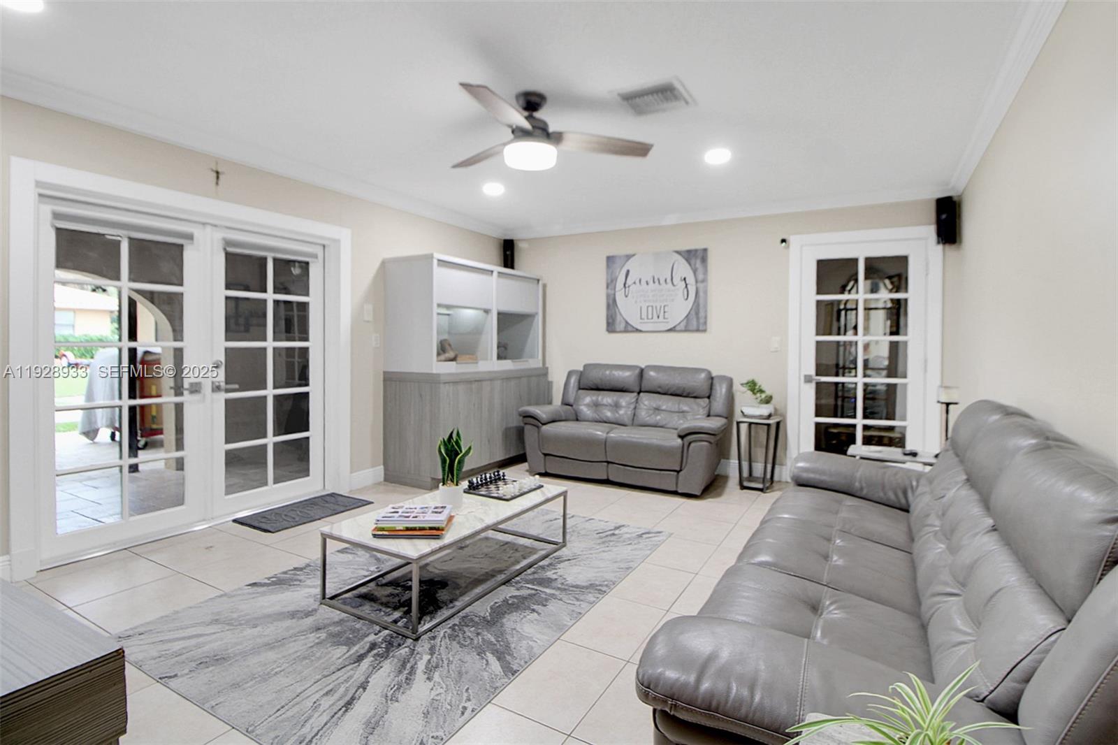50 Southwest 130th Avenue Miami, FL 33184 - Photo 19 of 70 a living room with furniture and window