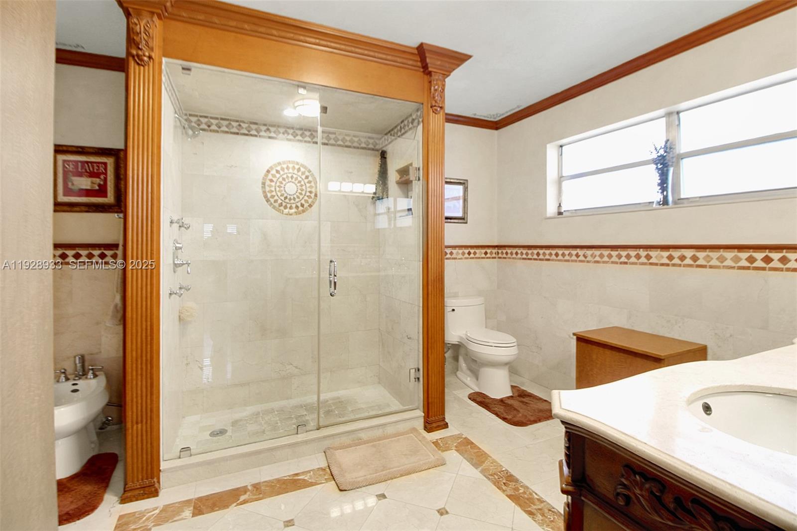 50 Southwest 130th Avenue Miami, FL 33184 - Photo 25 of 70 a bathroom with a shower a toilet and a sink