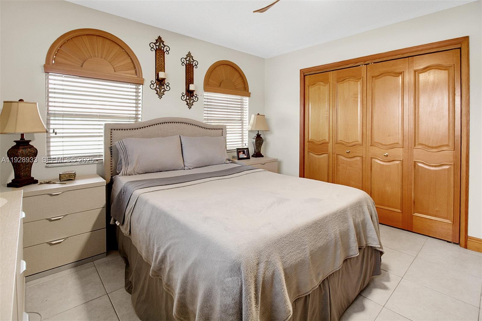 50 Southwest 130th Avenue Miami, FL 33184 - Photo 27 of 70 a bedroom with a bed and a window