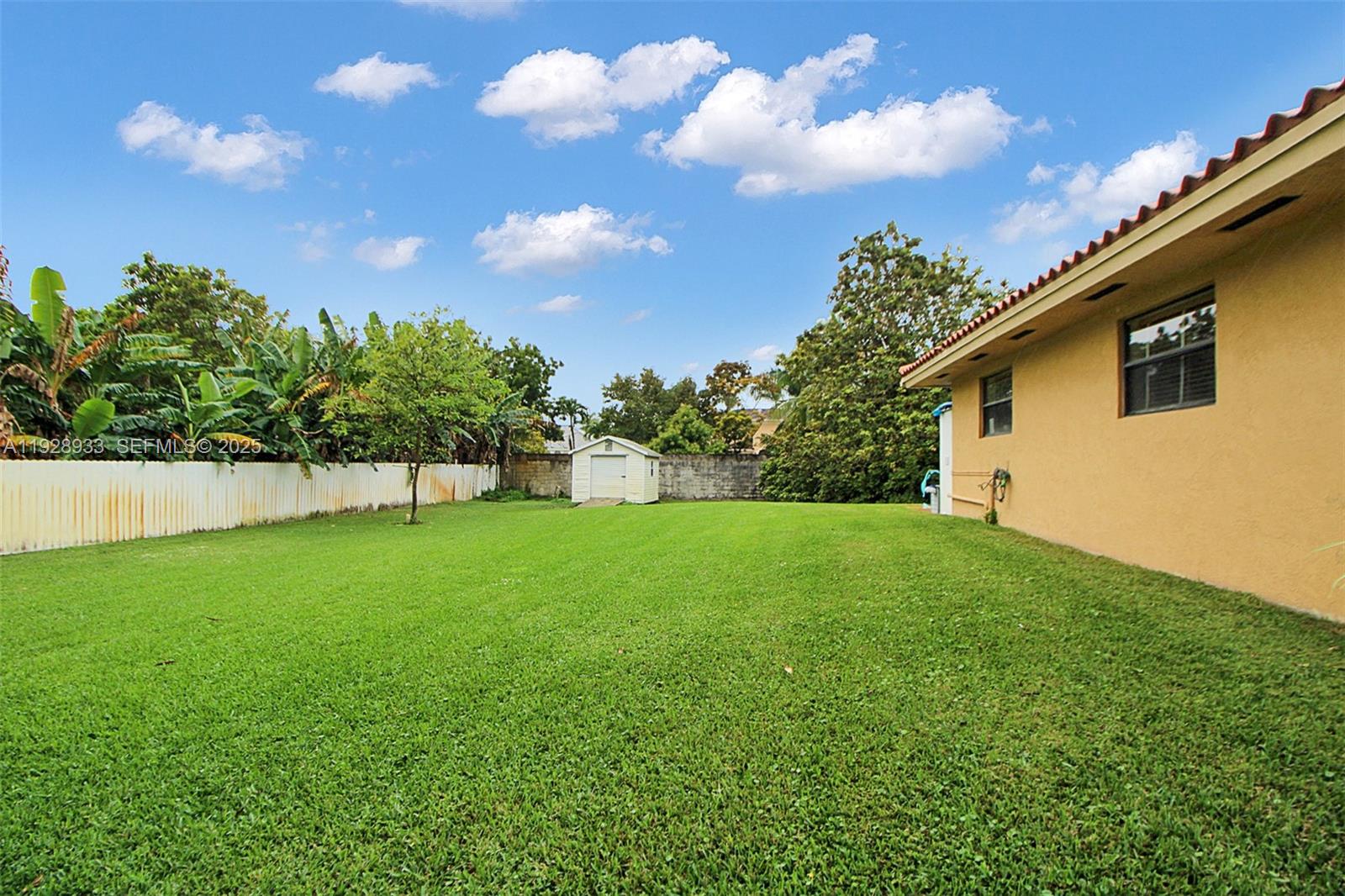 50 Southwest 130th Avenue Miami, FL 33184 - Photo 40 of 70 a view of a backyard with large trees