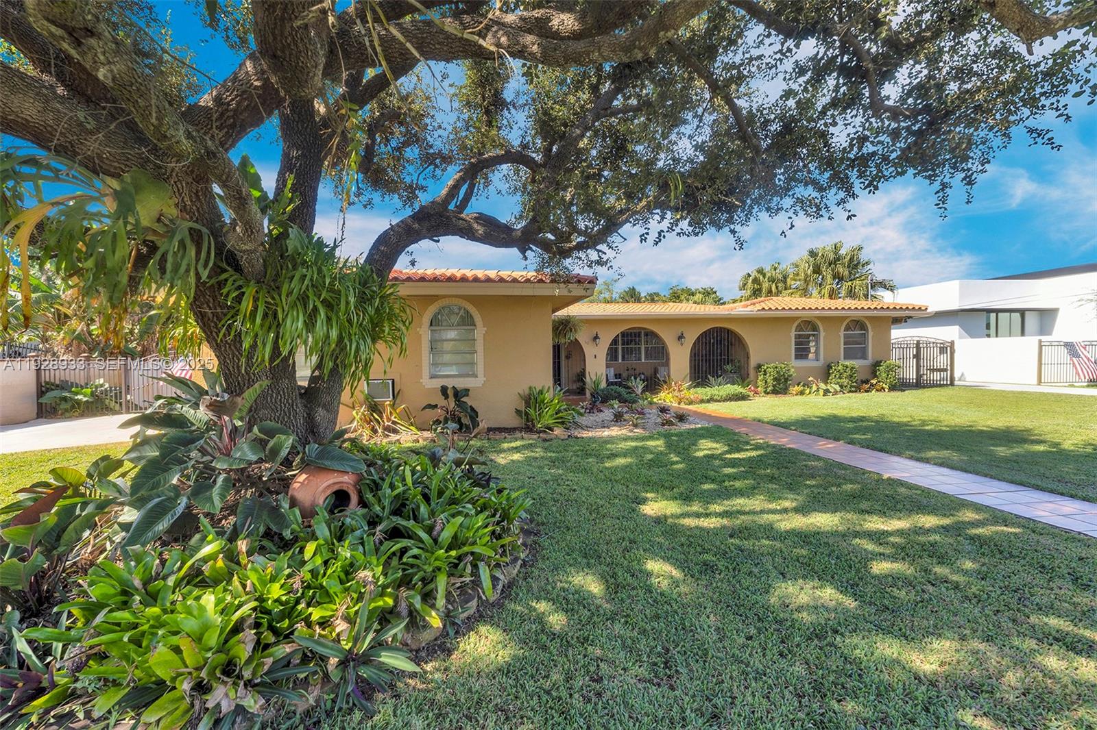 50 Southwest 130th Avenue Miami, FL 33184 - Photo 4 of 70 a front view of a house with garden