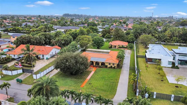 a lobby with furniture and floor to ceiling window
