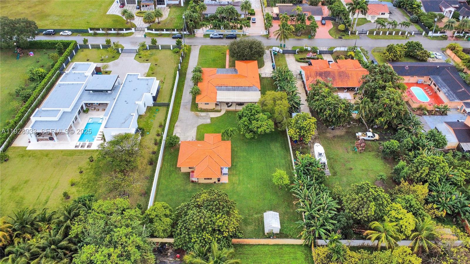 50 Southwest 130th Avenue Miami, FL 33184 - Photo 10 of 70 an aerial view of residential houses with outdoor space and lake view